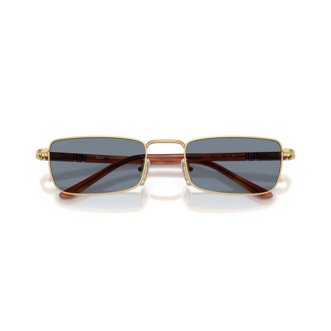Persol PO 1025S Col.1132/56 Cal.57: occhiale da sole, calibro 57, colore 1132/56. Materiale/finitura metallo oro e celluloide terra di siena, colore principale oro, lenti blu.