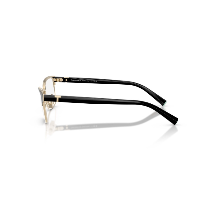 Tiffany & Co. TF 1168 col. 6164 è una montatura da vista da donna in acetato nero lucido su metallo oro pallido, dalla forma pillow e calibro 53.