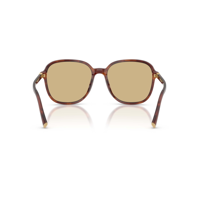 Miu Miu SMU B01 Col.26E-10R Cal.58: occhiale da sole, calibro 58, colore 26E-10R. Materiale/finitura celluloide marrone tabacco striato, colore principale marroni, lenti giallo.