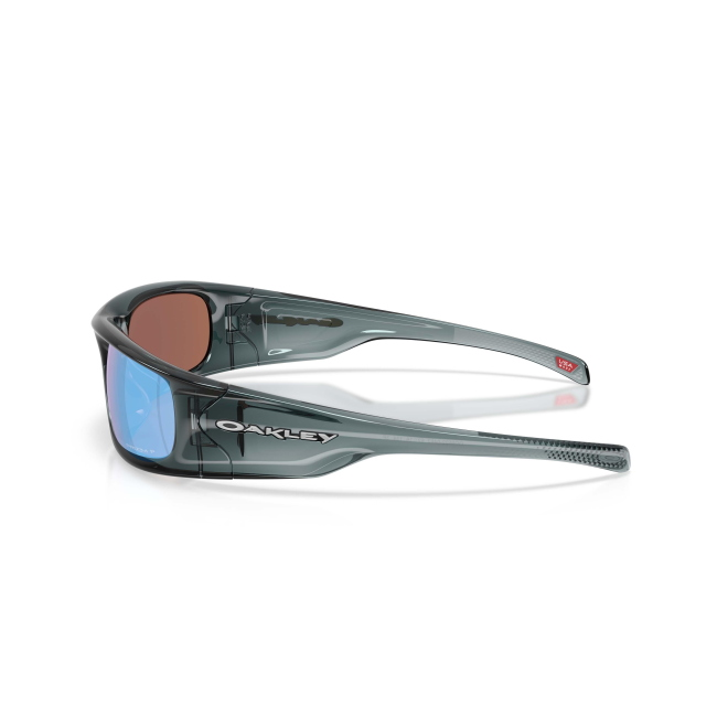 Oakley OO 9522 HIGHLAND Col.04 Cal.62: occhiale da sole, calibro 62, colore 04. Materiale/finitura celluloide cristallo nero, colore principale nero, lenti prizm deep water polarized.