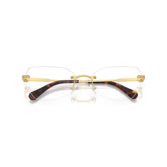 Swarovski SK 1031 col. 4007 è una montatura da vista da donna in metallo oro, dalla forma irregolare e calibro 56.