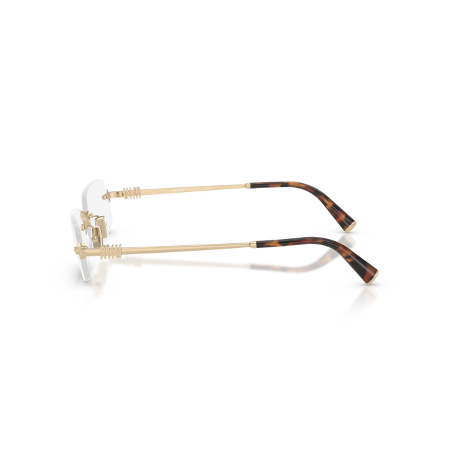 Miu Miu VMU 50Y col. ZVN-1O1 è una montatura da vista da donna in metallo oro pallido, dalla forma rettangolare e calibro 52.