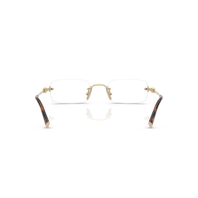 Miu Miu VMU 50Y col. ZVN-1O1 è una montatura da vista da donna in metallo oro pallido, dalla forma rettangolare e calibro 52.