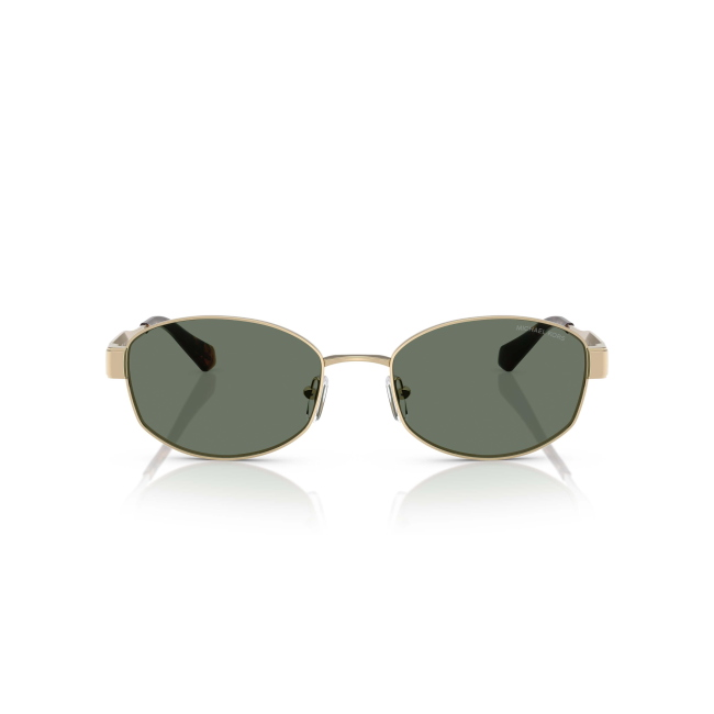 MICHAEL KORS MK 1161 MONTE CARLO col. 10143H è un occhiale da sole da donna in metallo oro chiaro, dalla forma ovale e calibro 56.