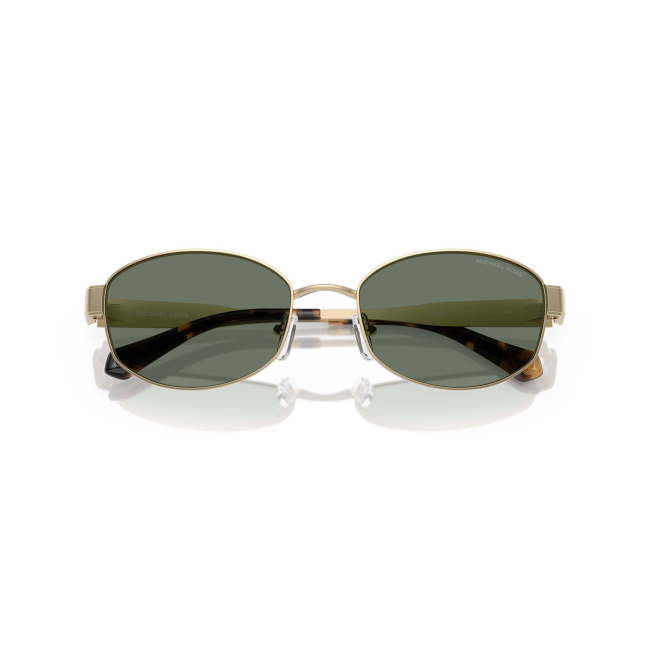 MICHAEL KORS MK 1161 MONTE CARLO col. 10143H è un occhiale da sole da donna in metallo oro chiaro, dalla forma ovale e calibro 56.