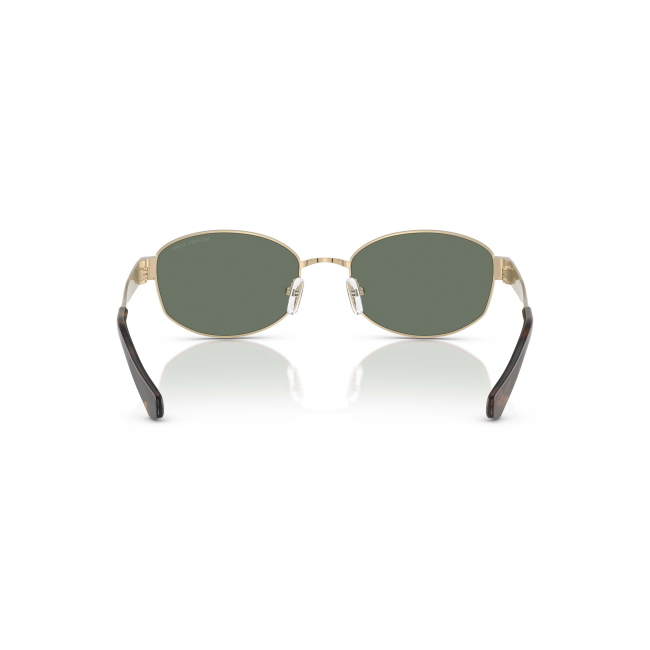 MICHAEL KORS MK 1161 MONTE CARLO col. 10143H è un occhiale da sole da donna in metallo oro chiaro, dalla forma ovale e calibro 56.