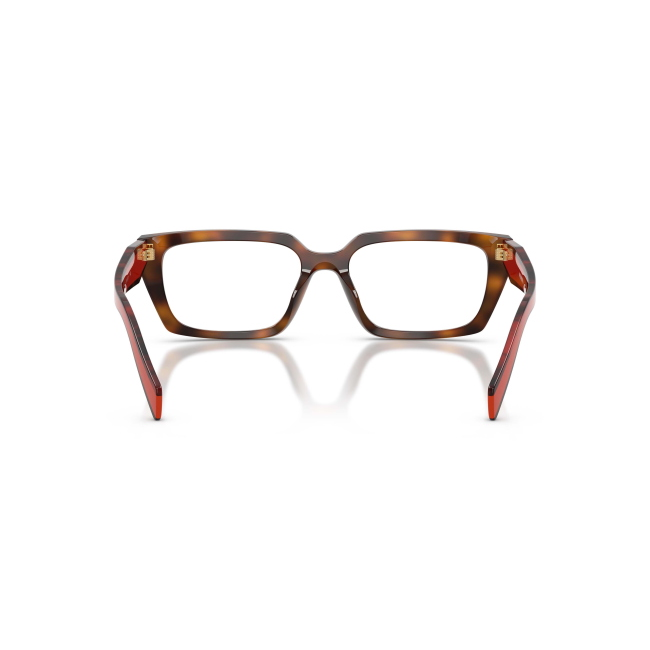 Prada VPR D05 col. 01K-1O1 è una montatura da vista da donna in acetato marrone tartarugato, dalla forma rettangolare e calibro 55.