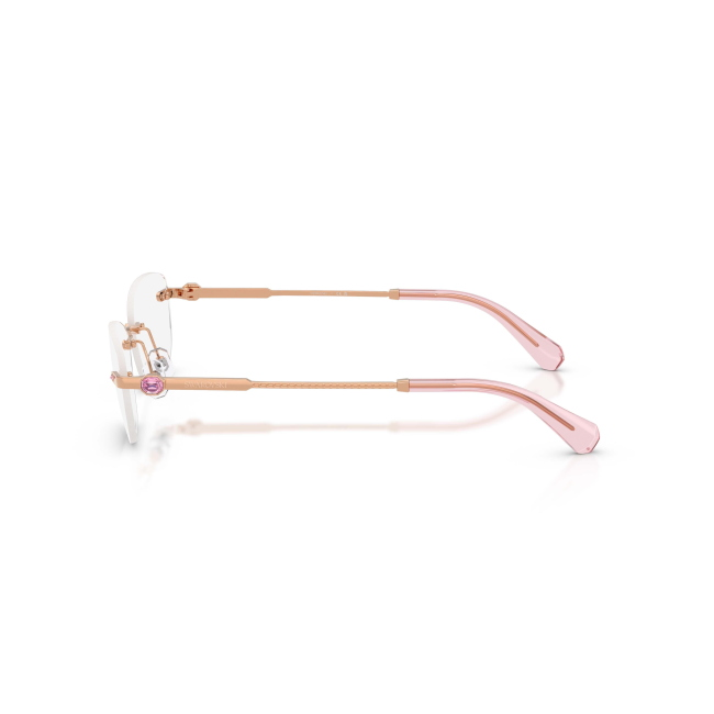 Swarovski SK 1037 col. 4014 è una montatura da vista da donna in metallo oro rosa, dalla forma ovale e calibro 54.