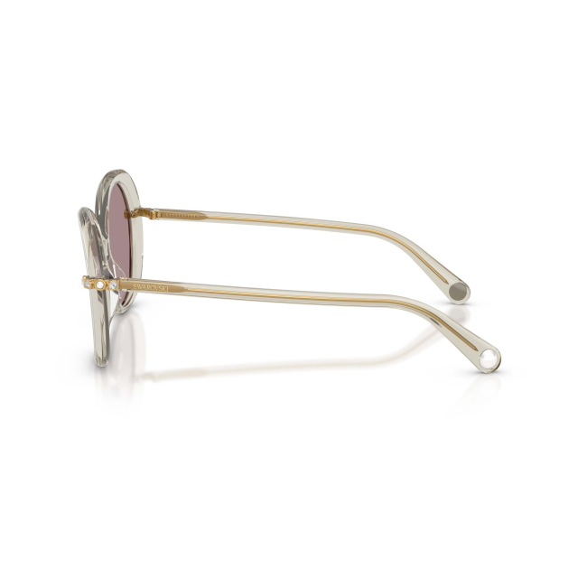 Swarovski SK 6059 col. 3003/LA è un occhiale da sole da donna in acetato beige trasparente, dalla forma farfalla e calibro 55.