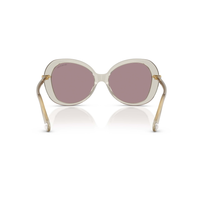 Swarovski SK 6059 col. 3003/LA è un occhiale da sole da donna in acetato beige trasparente, dalla forma farfalla e calibro 55.