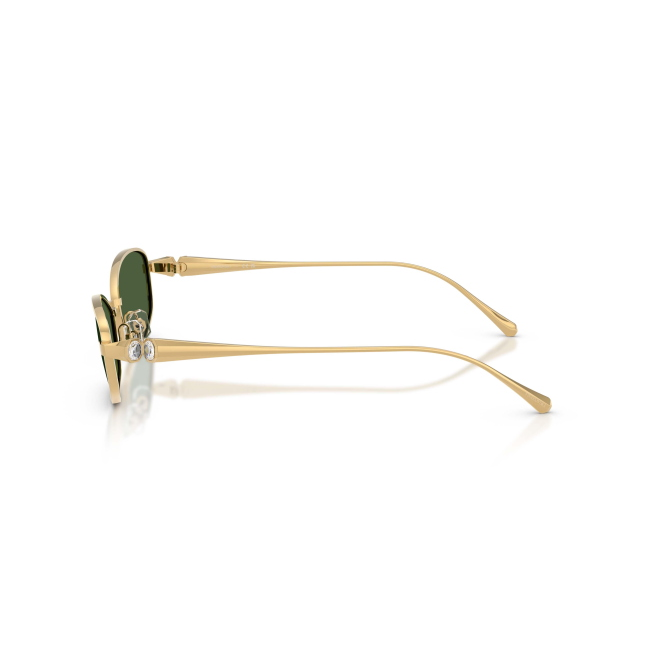 Swarovski SK 7042 col. 4004/71 è un occhiale da sole da donna in metallo oro, dalla forma pillow e calibro 55.