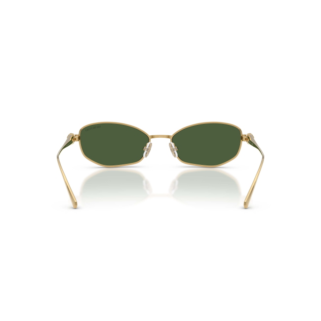 Swarovski SK 7042 col. 4004/71 è un occhiale da sole da donna in metallo oro, dalla forma pillow e calibro 55.
