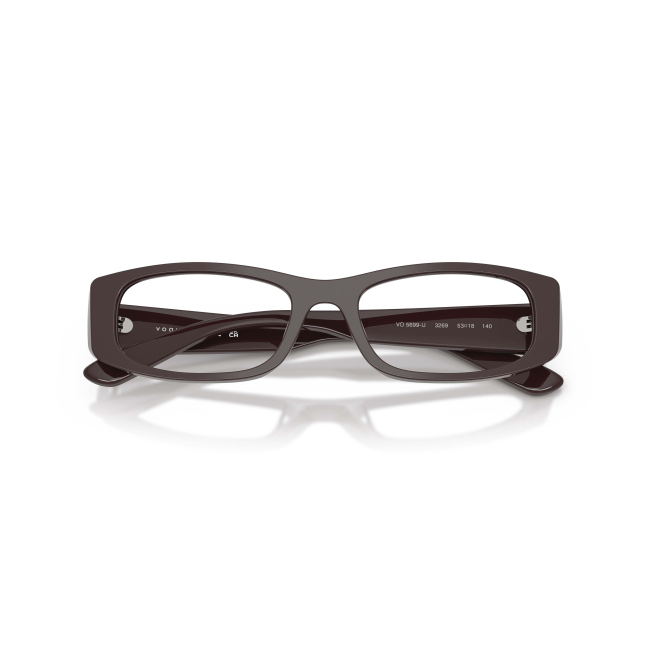 Vogue VO 5699U col. 3269 è una montatura da vista in acetato marrone moka e calibro 51.