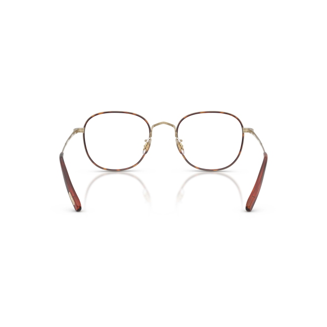 Oliver Peoples OV 1375T MEHR col. 5035 è una montatura da vista in titanio oro e mogano scuro e calibro 50.