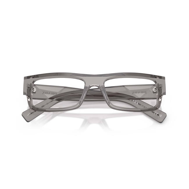Prada VPR D06 col. 16Z-1O1 è una montatura da vista in acetato grigio trasparente e calibro 55.