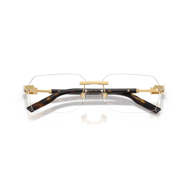 Dolce & Gabbana DG 1361 col. 02 è una montatura da vista da uomo in metallo oro, dalla forma rettangolare e calibro 60.