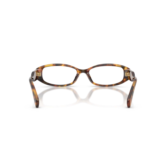 Miu Miu VMU 06Z col. 14L-1O1 interpreta il modello con acetato MARRONE TARTARUGATO. La forma Rettangolare e il calibro 54 ne definiscono il carattere.