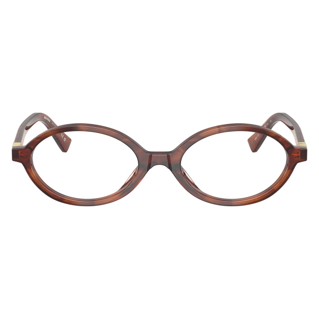 Miu Miu VMU 01X 26E-1O1: occhiale da vista da donna dalla forma ovale in acetato Tabacco striato, calibro 50.