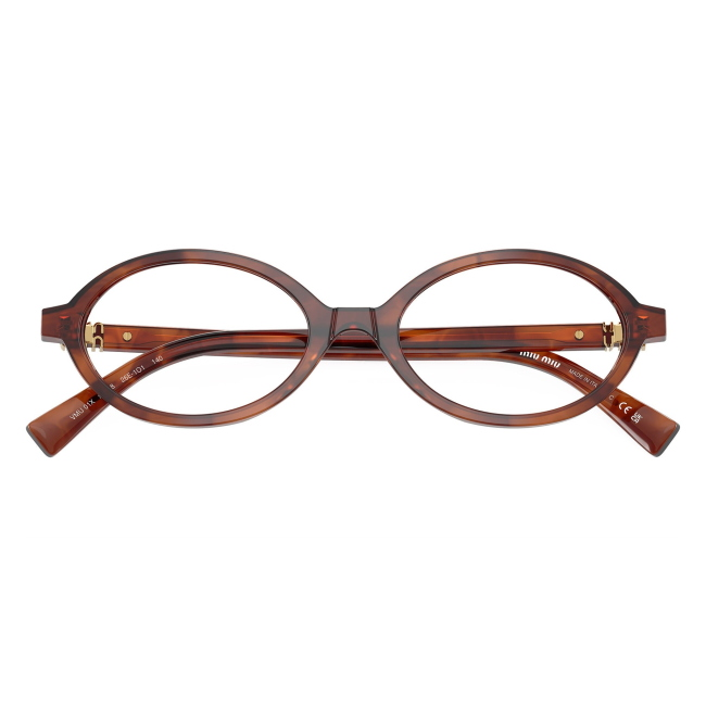 Miu Miu VMU 01X 26E-1O1: occhiale da vista da donna dalla forma ovale in acetato Tabacco striato, calibro 50.