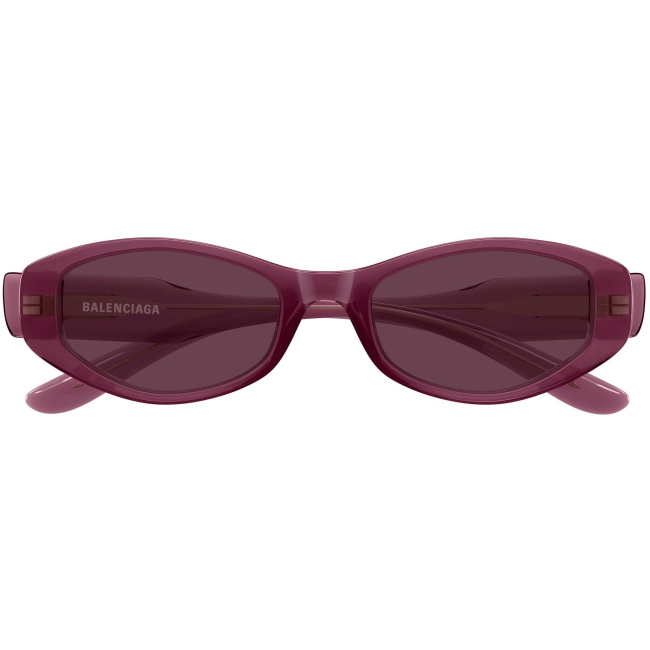 Balenciaga BB0509S, colore 004. Occhiali da sole dalla forma ovale, finitura bordeaux, misure 53-19-140 mm.